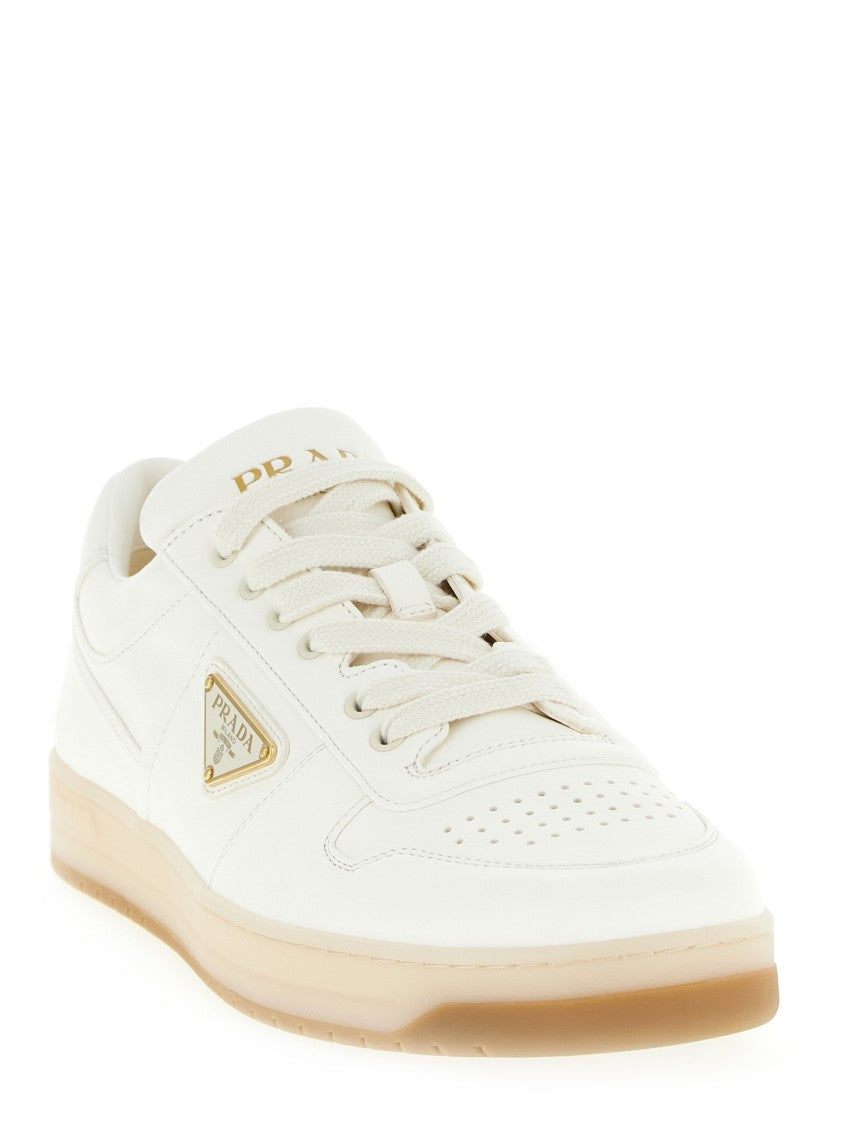 Prada Sleek Nappa Leather Sneakers With Metal Triangle Logo