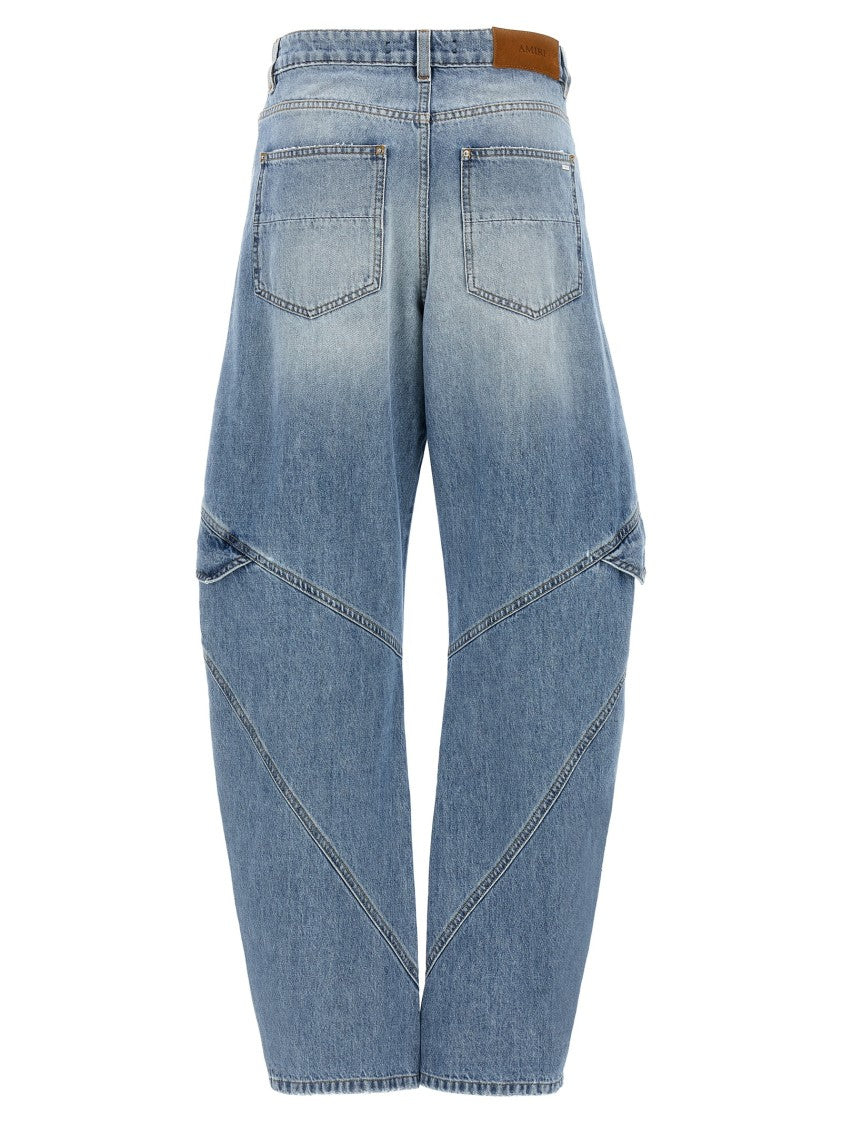 Amiri Stone Washed Denim Jeans With Panel Construction And Cargo Pockets