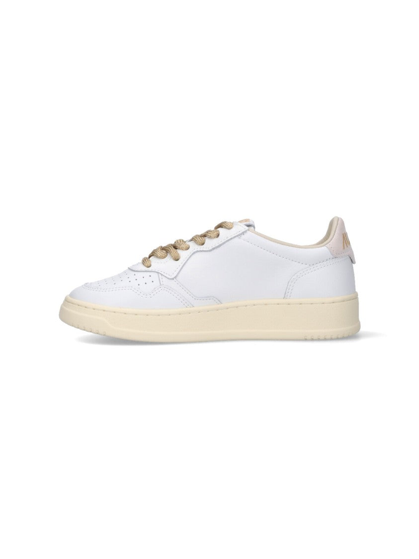 Autry Low-Top Sneakers With Suede Accents And Golden Details
