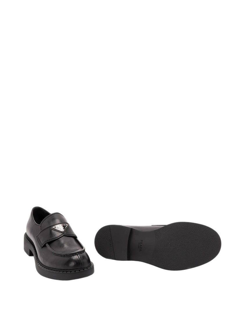 Prada Enamelled Triangle Logo Black Leather Slip-On Shoes