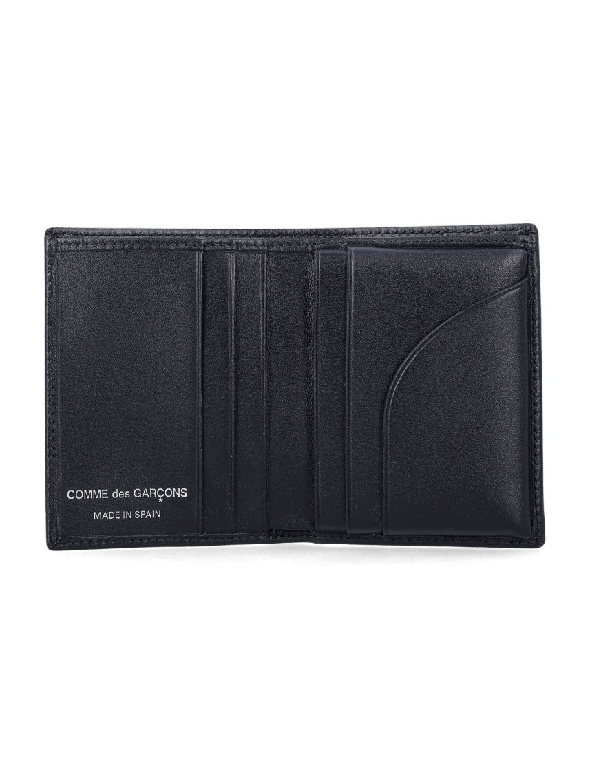 Comme Des Garçons Sleek Black Wallet With Distinctive Silver Accent