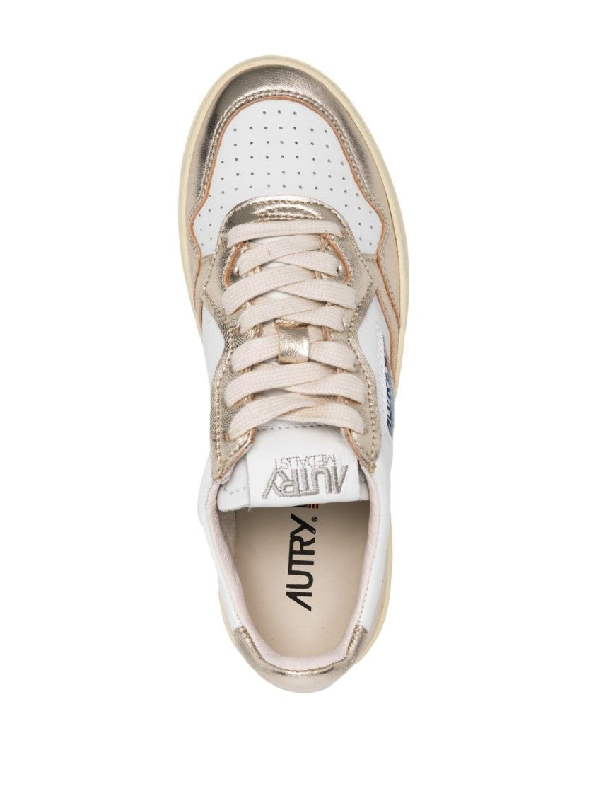 Autry Sleek Sneakers With Metallic Accents And Chunky Sole