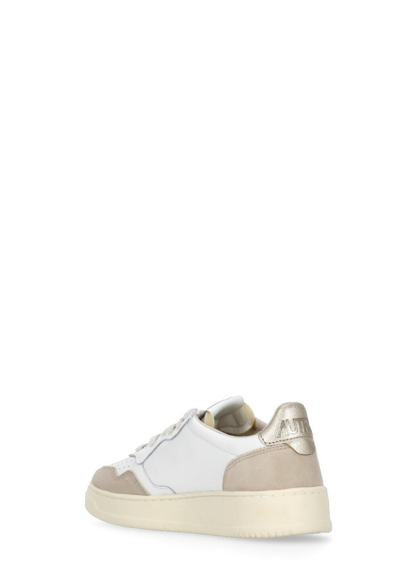 Autry White Smooth Leather Golden Accent Sneakers