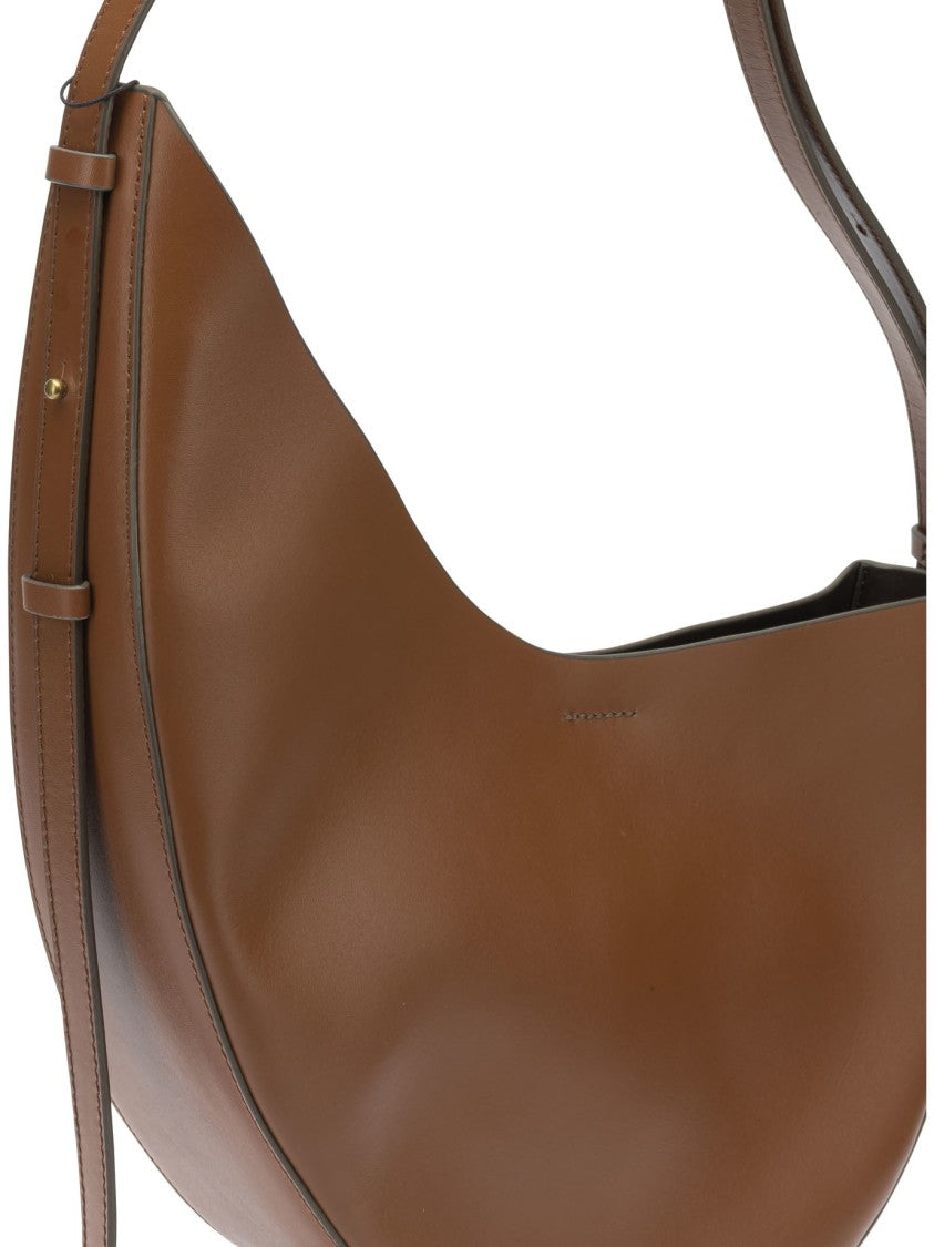 Soeur Crescent-Shaped Leather Shoulder Bag With Adjustable Strap