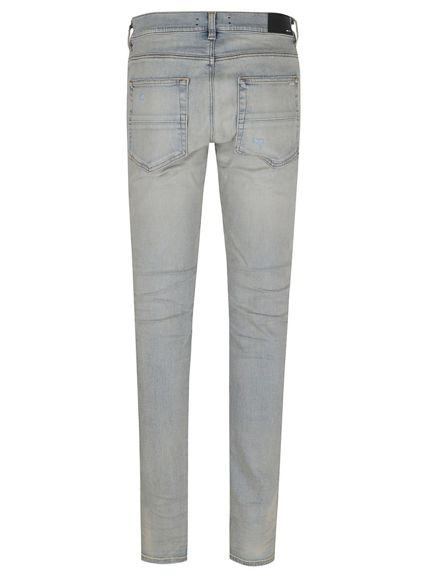 Amiri Light Faded Distressed Skinny Jeans