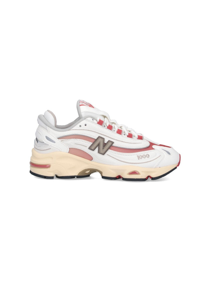 New Balance White Leather Sneakers With Red Mesh Accents