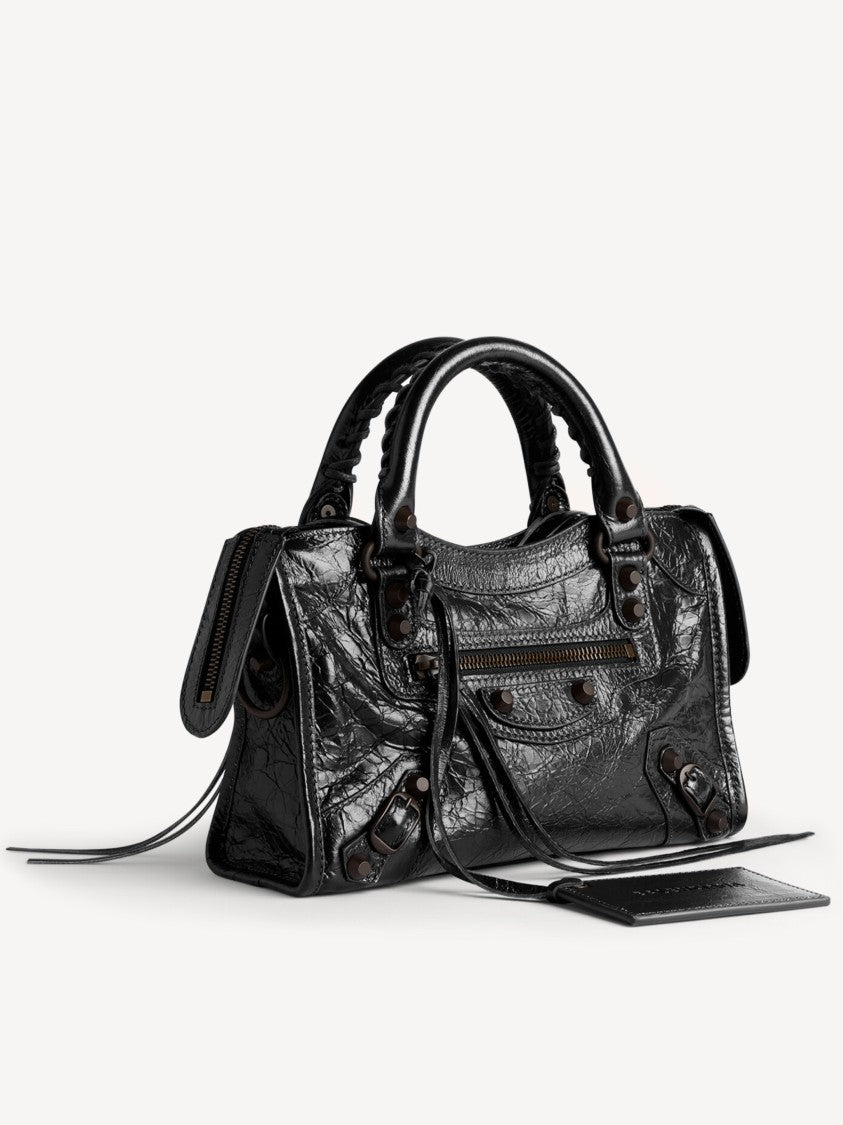 Balenciaga Compact Textured Handbag With Braided Detailing And Glossy Finish
