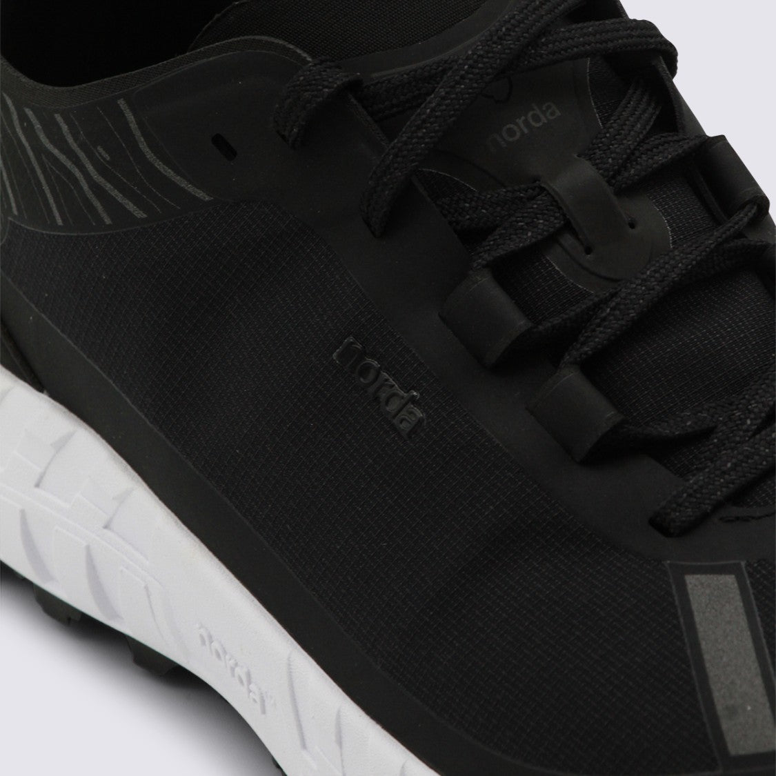 Norda Textured Black Sneakers With Contrasting White Sole