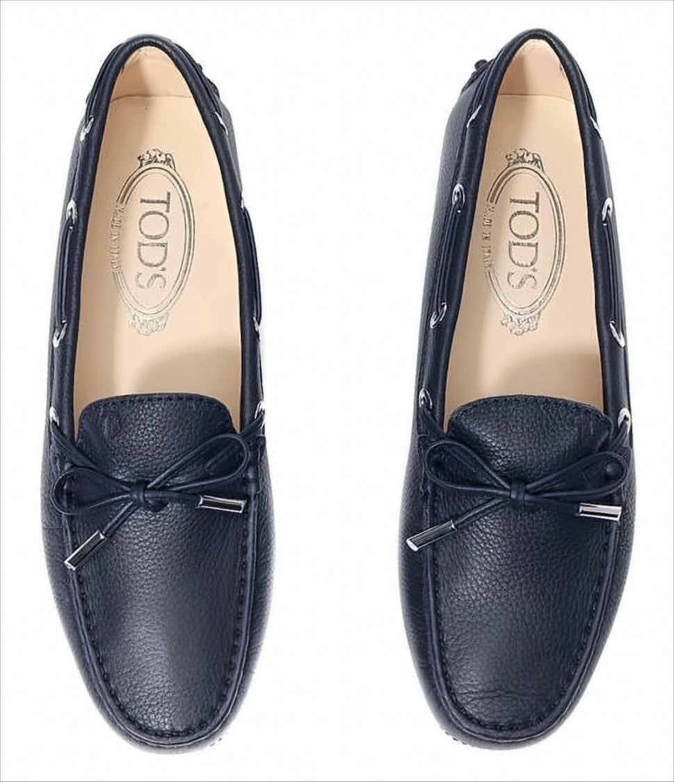 Tod's Pebbled Leather Loafers With Decorative Bow And Studded Sole