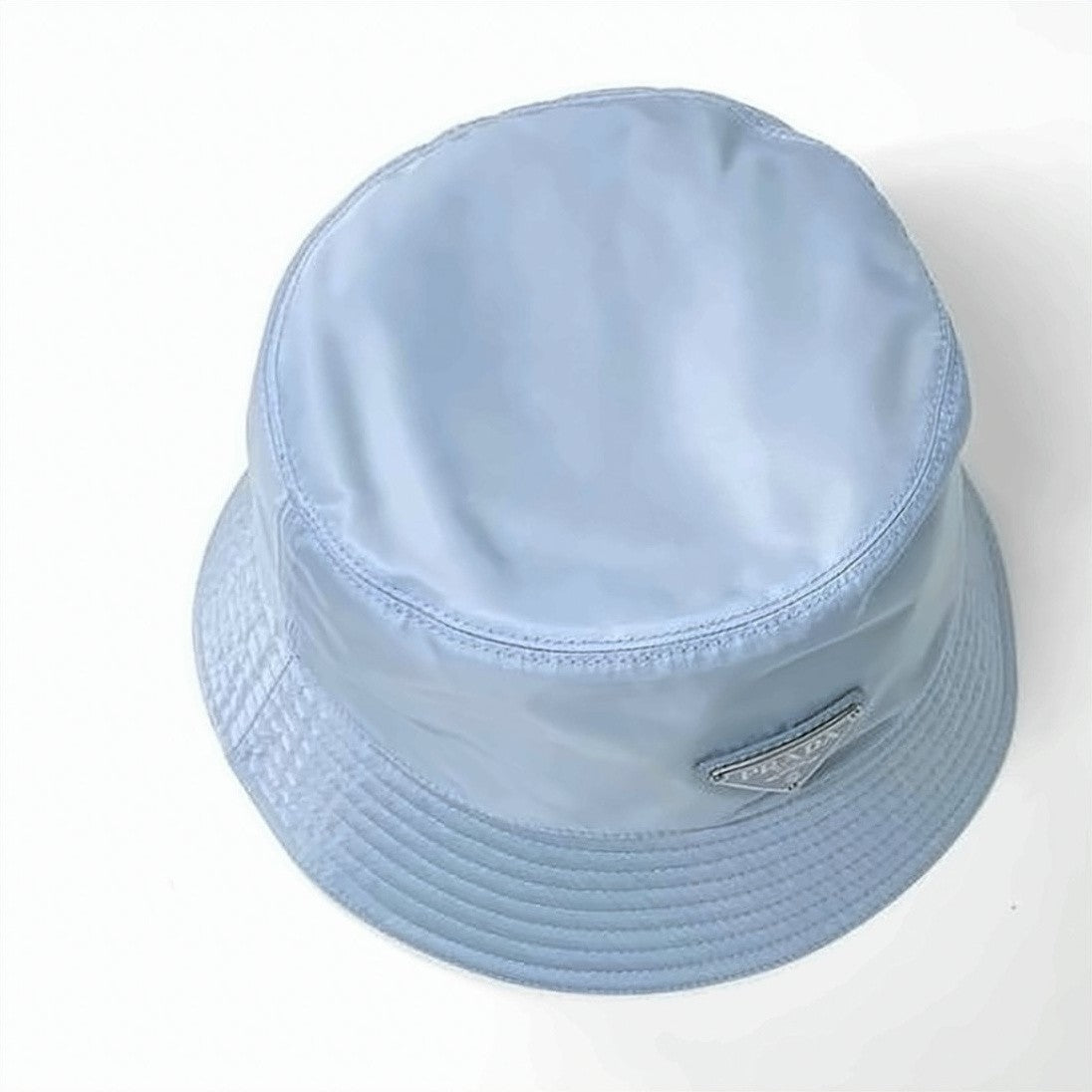 Prada Nylon Bucket Hat With Triangular Logo Plaque