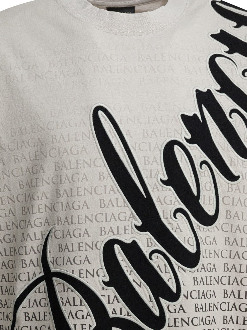 Balenciaga Dropped Shoulder Oversized T-Shirt With Bold Graphic Print