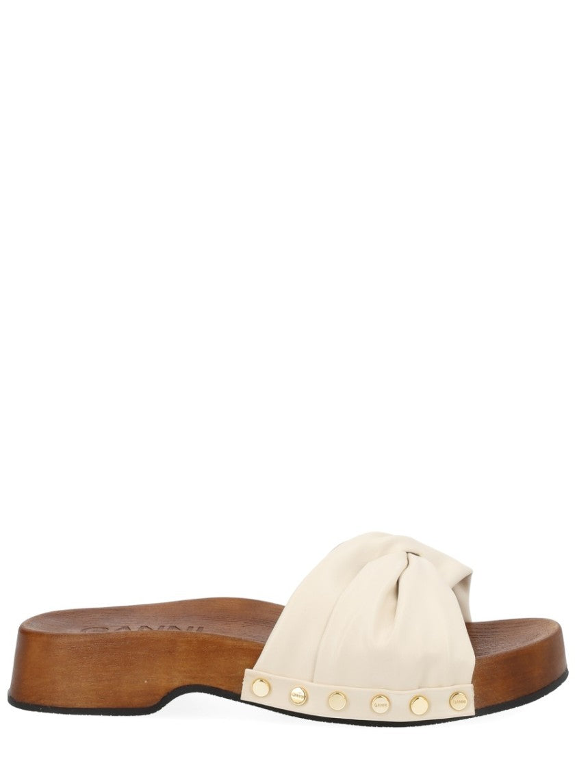 Ganni Tia Fairy Twisted Strap Wood Mules