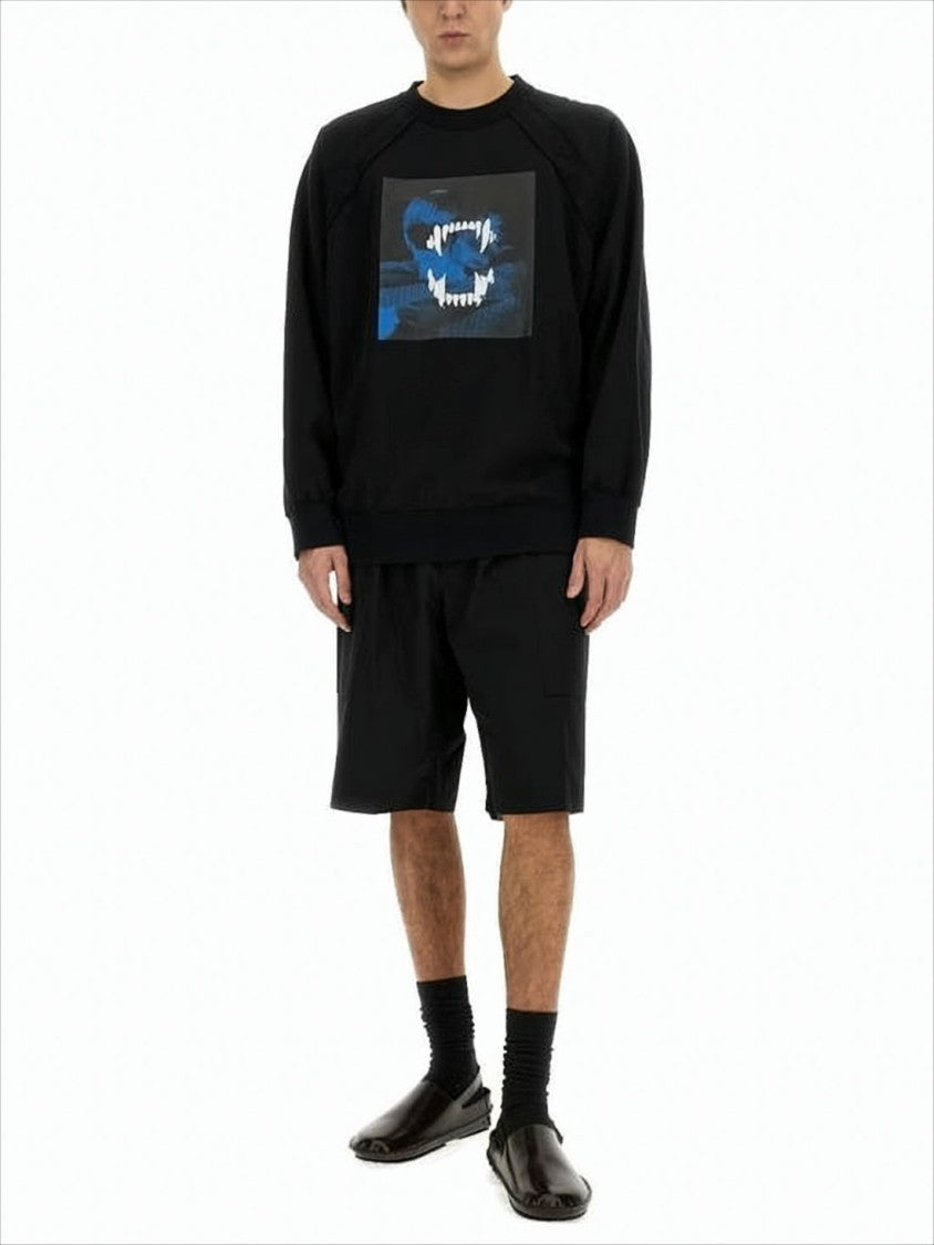 Undercover Relaxed Fit Long-Sleeve Graphic T-Shirt With Raglan Sleeves