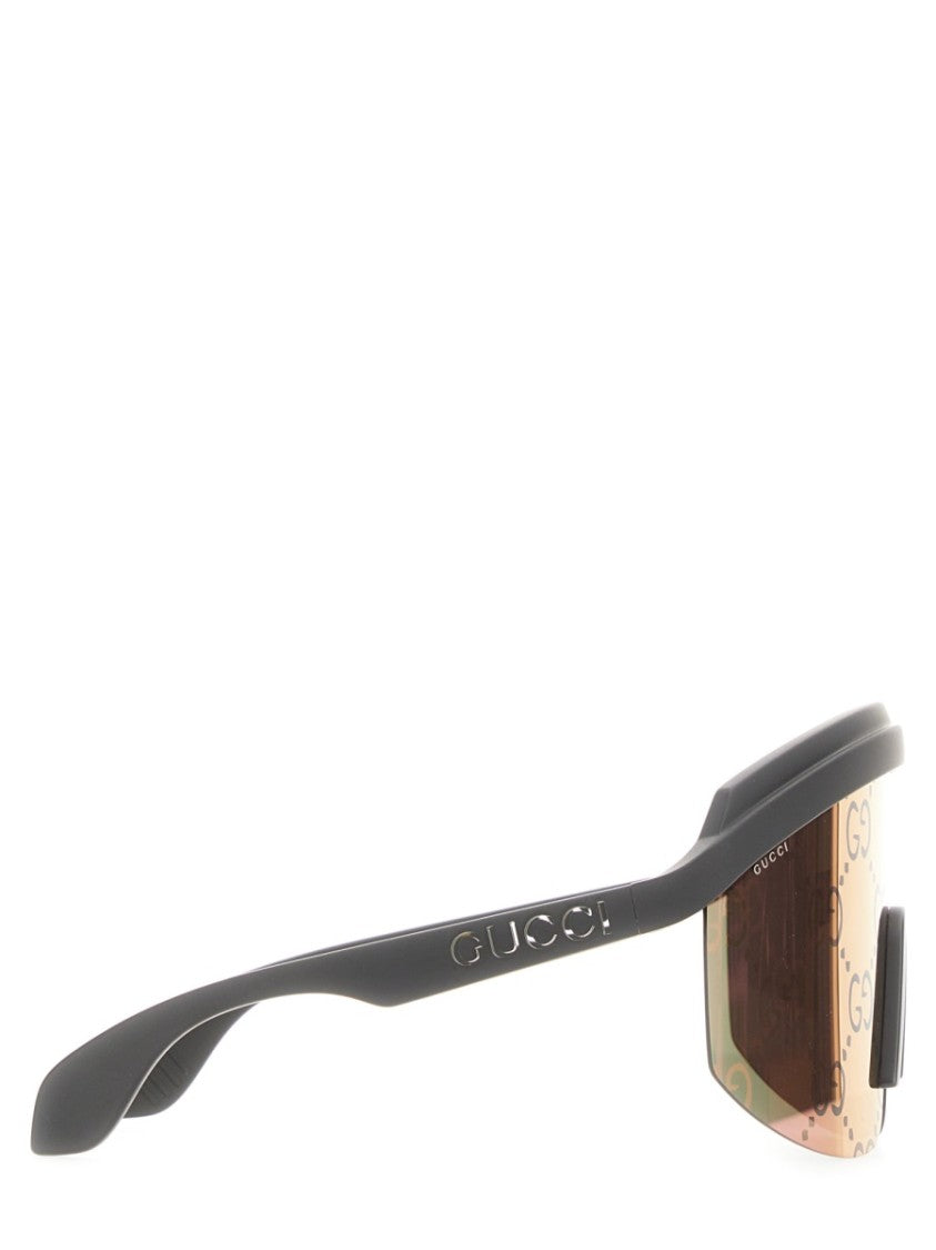 Gucci Rubberized Frame Sunglasses With Subtle Logo Detail