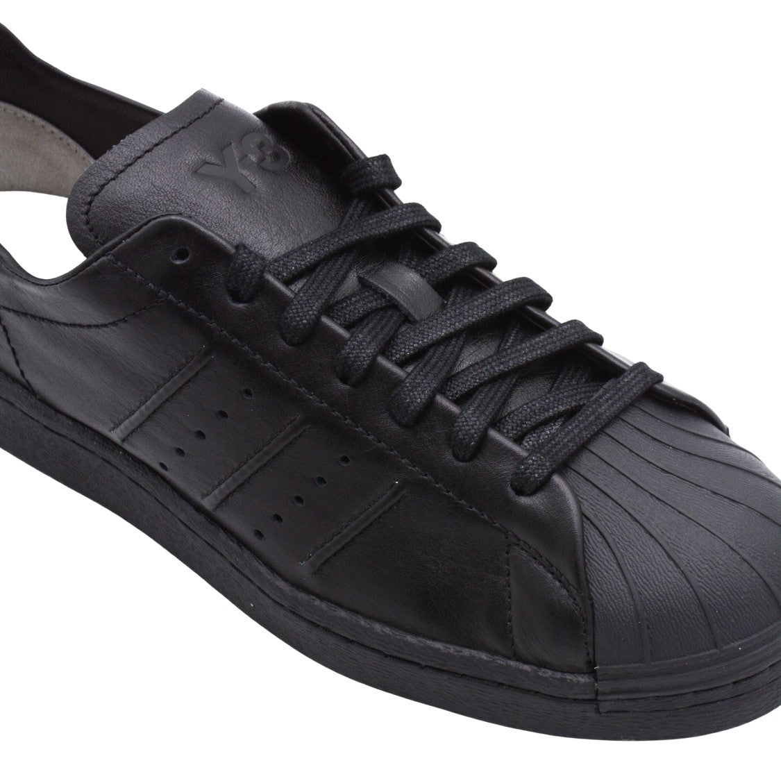 Y-3 Monochromatic Black Low-Top Sneakers With Perforated Stripes