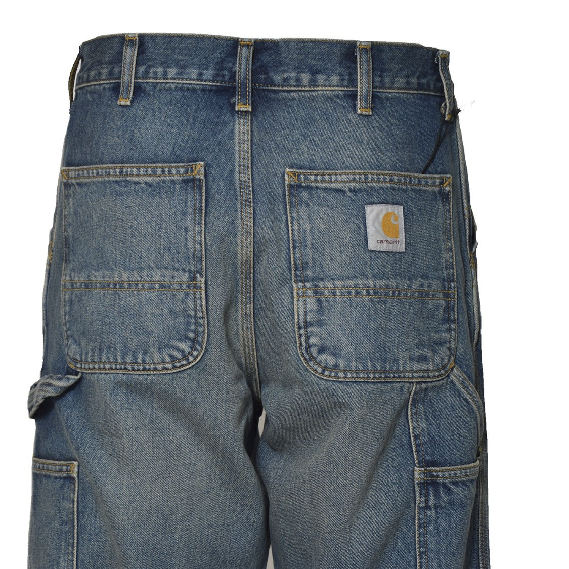 Carhartt Wip Relaxed Fit Denim Jeans With Subtle Distressing And Patch Pockets