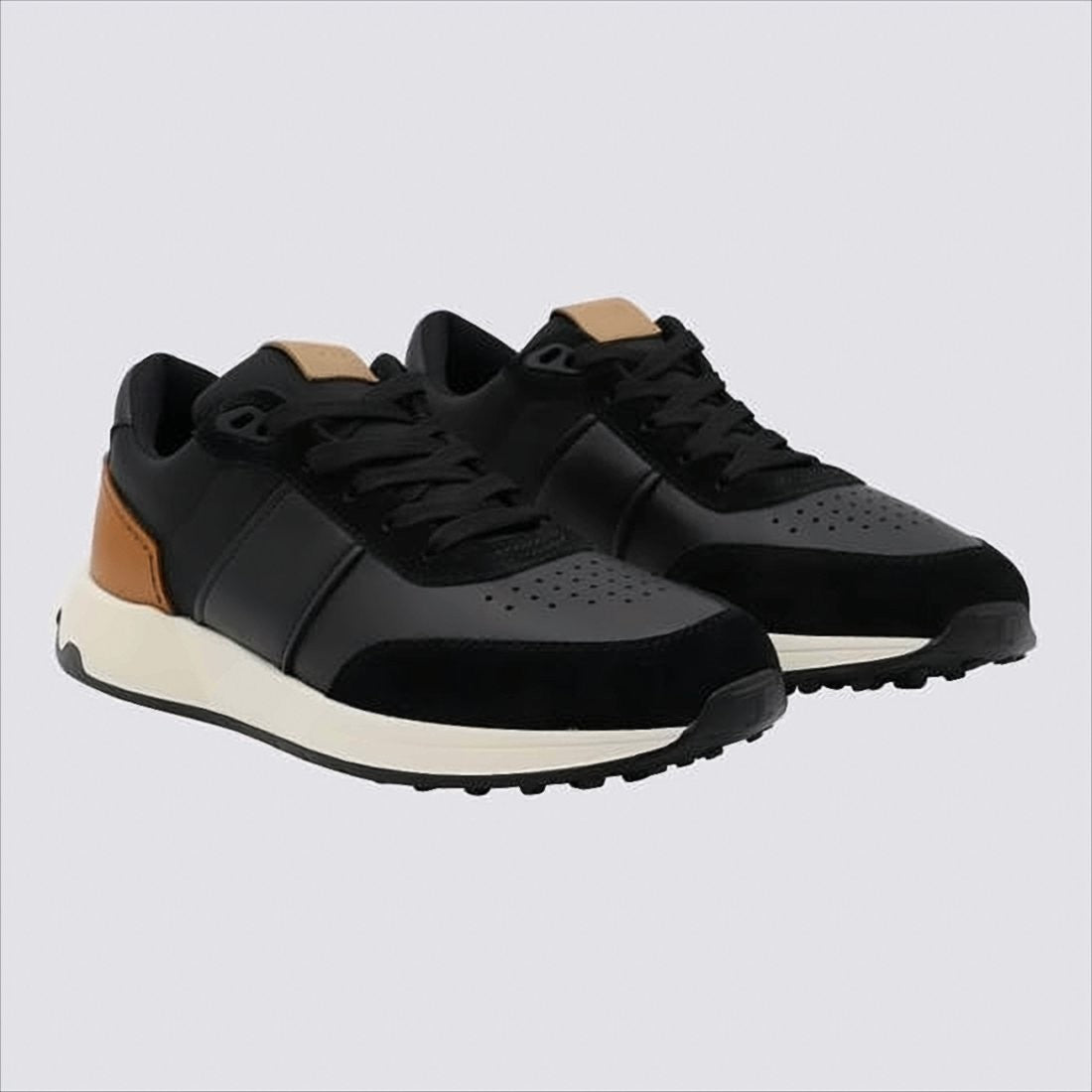 Tod's Black Leather Sneakers With Perforated Detailing And Tan Heel Patch