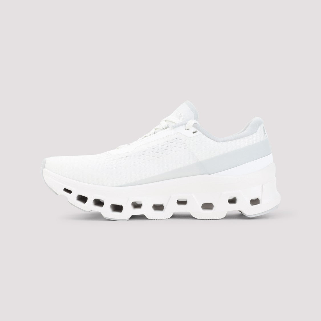 On Contemporary White Sneakers With Breathable Upper And Innovative Sole