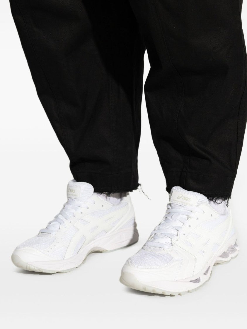 Comme Des Garçons Minimalist White Sneakers With Classic Low-Top Silhouette