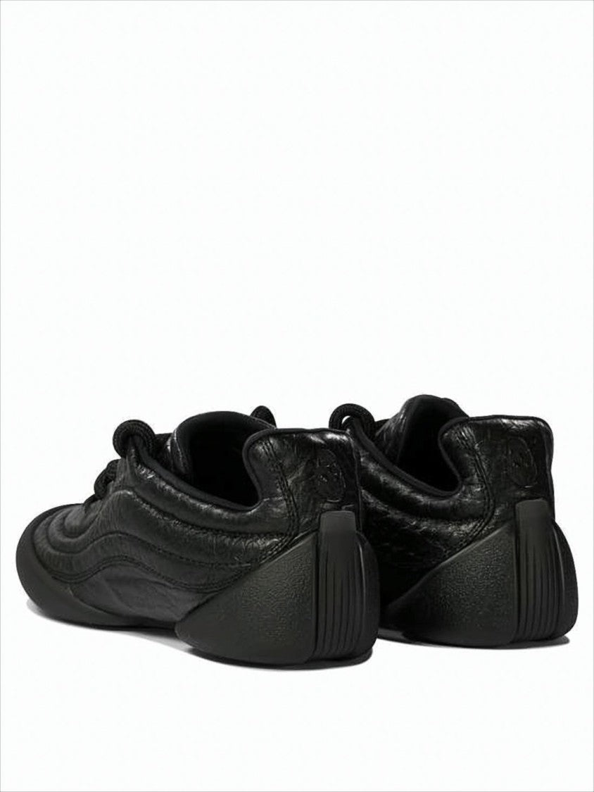 Alexander Mcqueen Textured Leather Sneakers With Minimalist Design