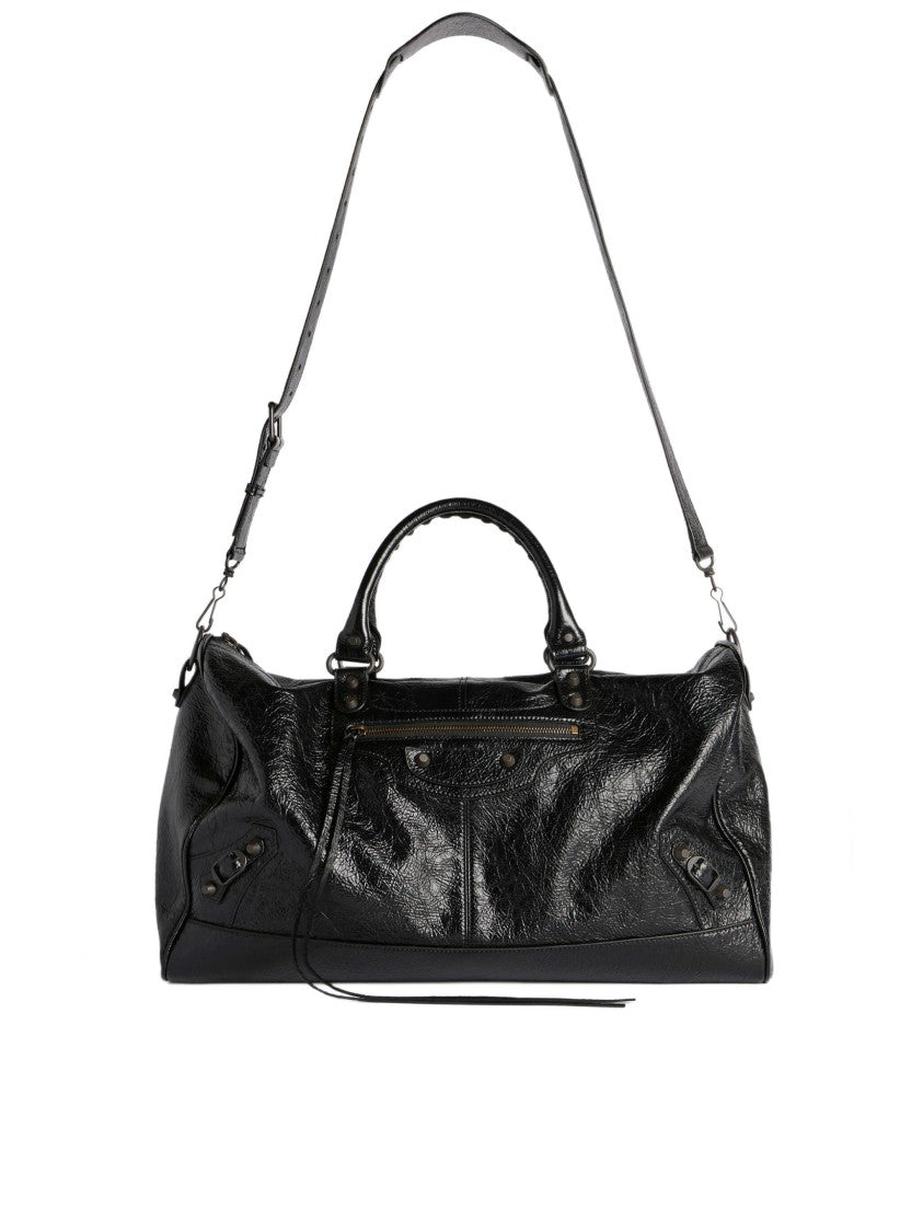 Balenciaga Glossy Black Leather Duffle Bag With Studded Zip Pocket
