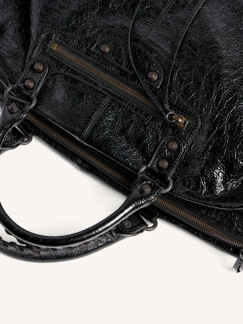 Balenciaga Glossy Black Leather Duffle Bag With Studded Zip Pocket