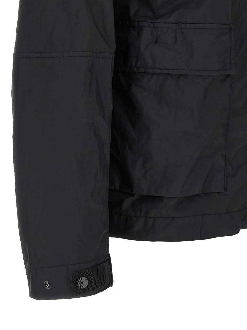 Stone Island Technical Black Jacket With Adjustable Hood And Drawstring Hem