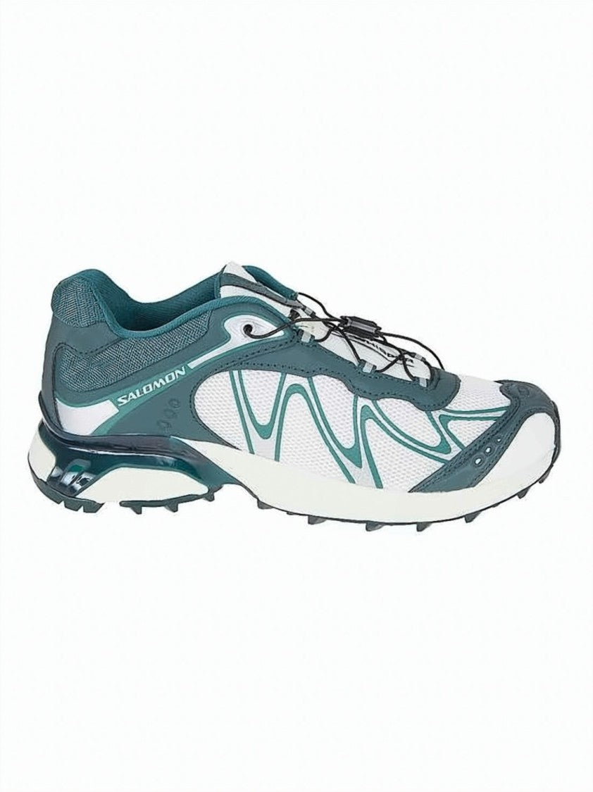 Salomon Low-Profile Sneakers With Teal Overlays And Rugged Sole