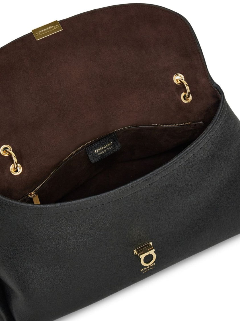 Ferragamo Elongated Gold-Tone Accent Black Calfskin Handbag