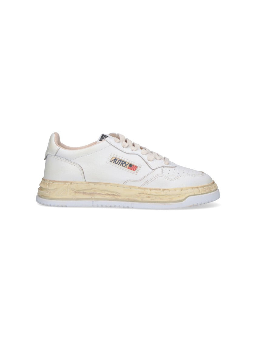 Autry Calfskin Low-Top Sneakers With Vintage Detailing