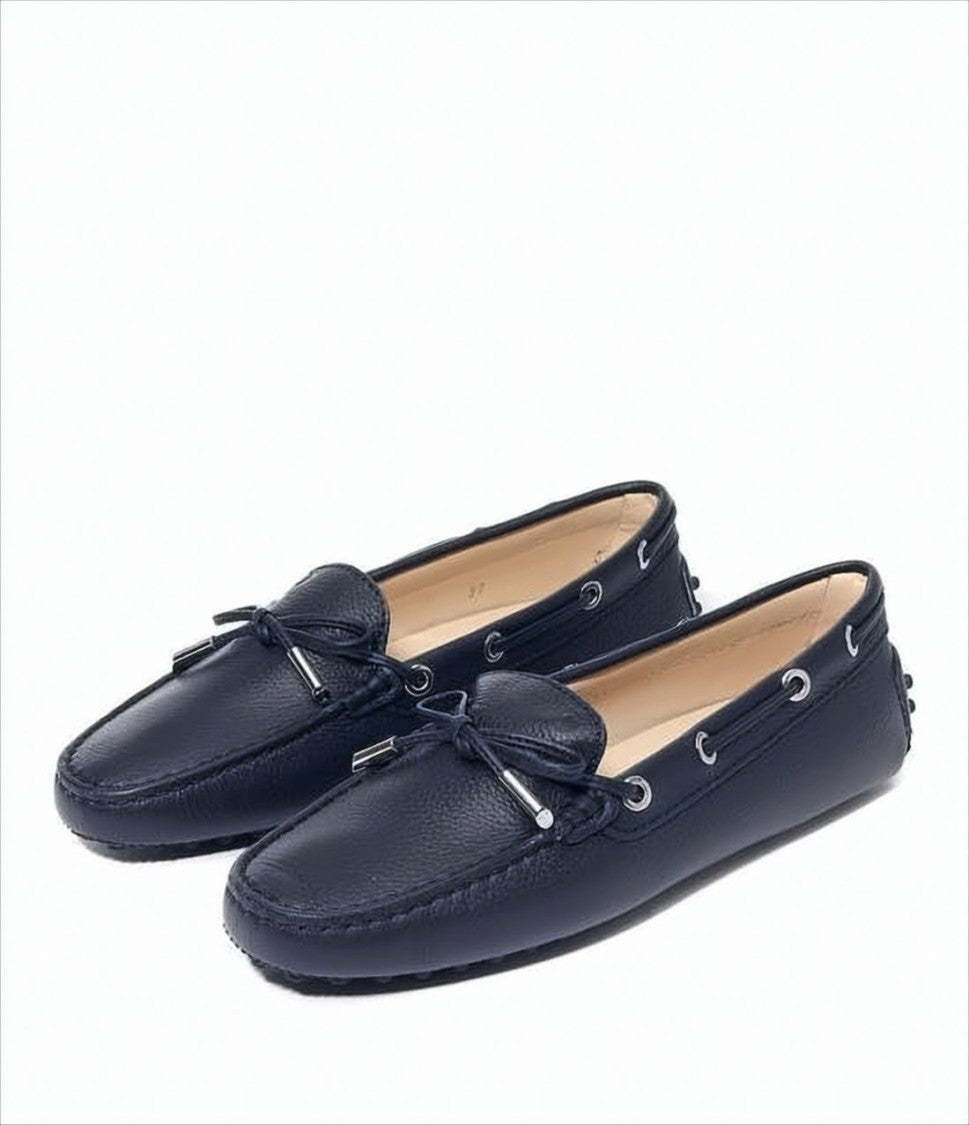 Tod's Pebbled Leather Loafers With Decorative Bow And Studded Sole