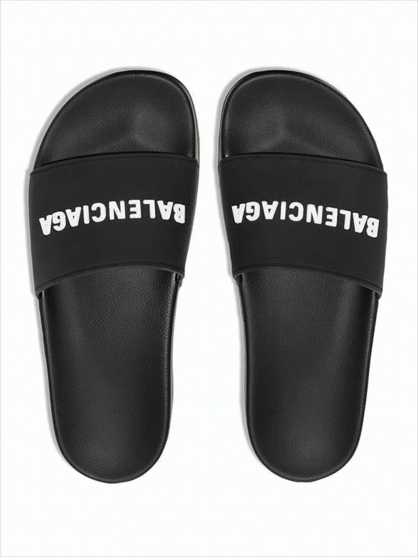 Balenciaga Contemporary Black Rubber Slide Sandals With Embossed Branding