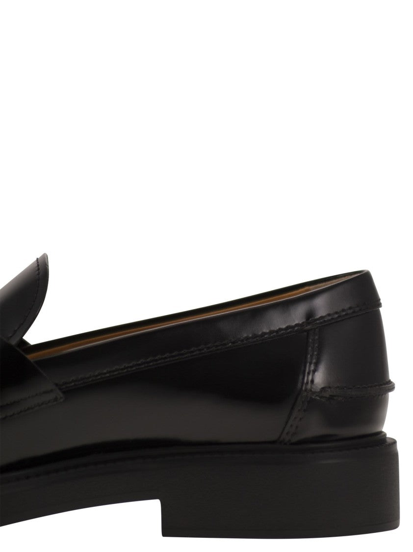 Tod's Calfskin Leather Moccasins With Metal Logo Mask