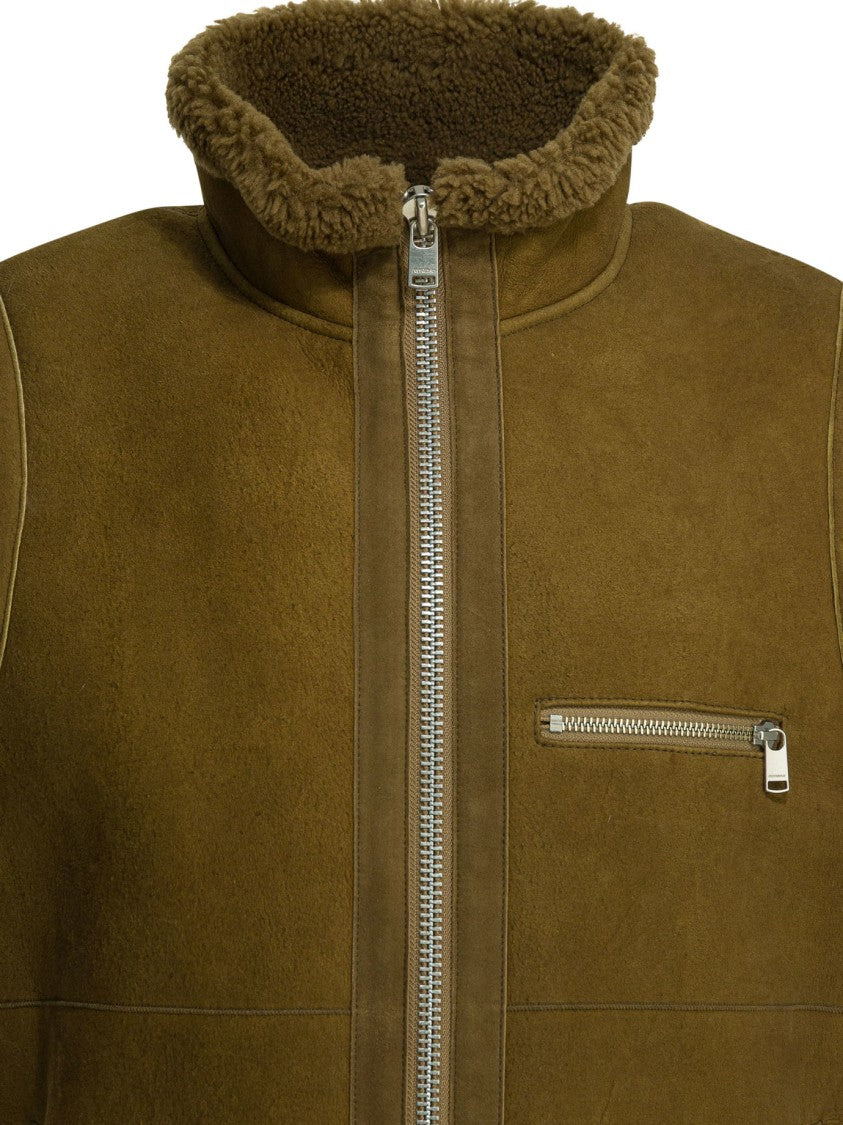 Nonnative Shearling Sleeveless Jacket With Natural Lining And Zippered Pockets