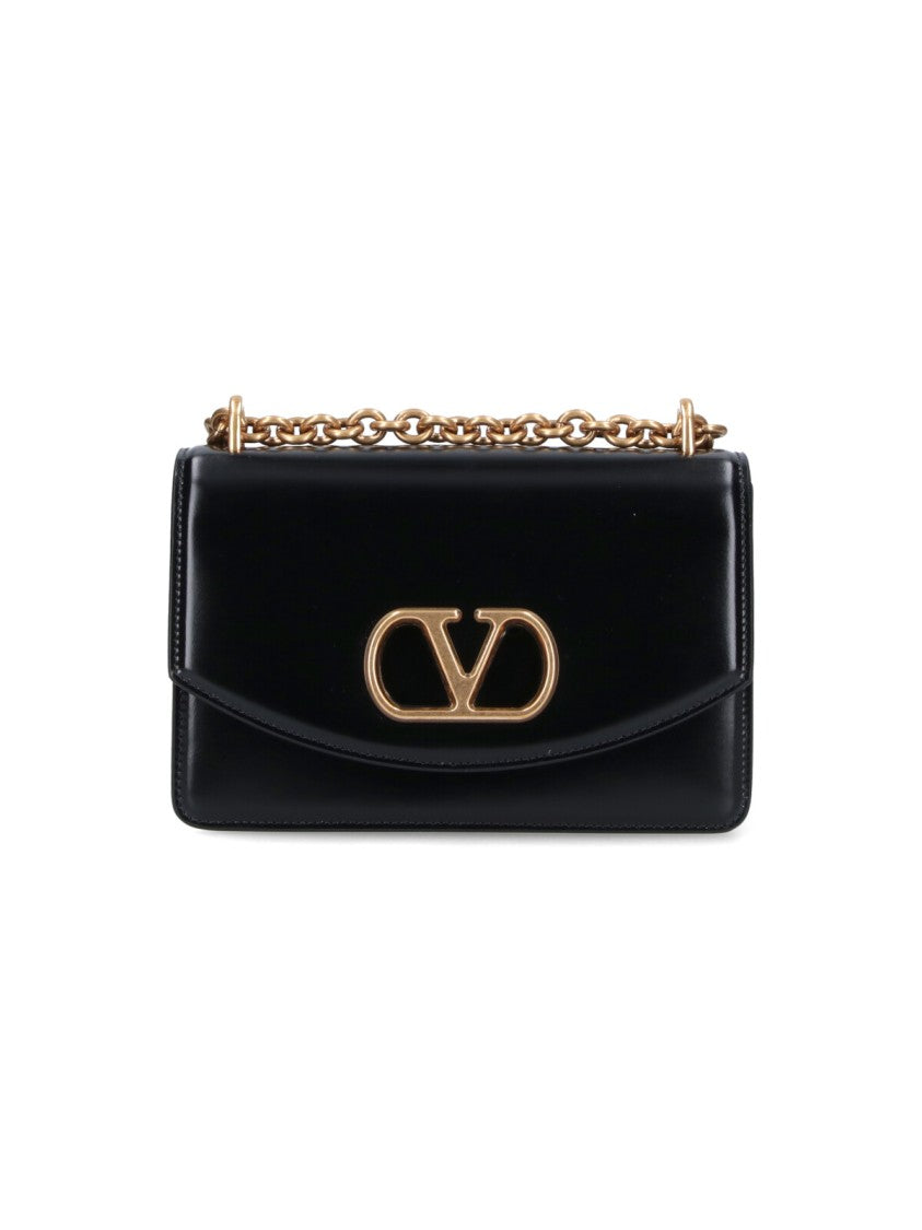 Valentino Garavani Structured Black Handbag With Gold-Tone Emblem And Chain Strap