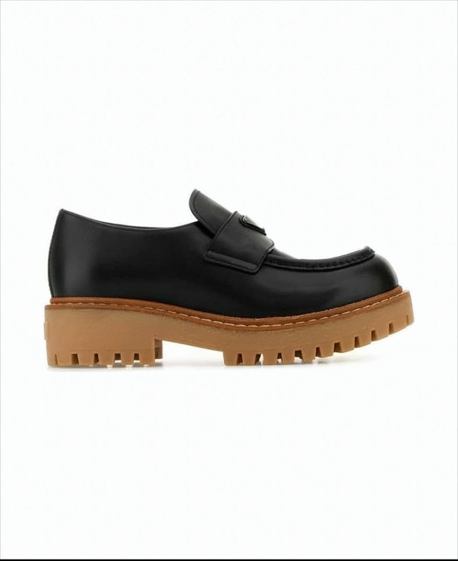 Prada Rounded Toe Calf Leather Loafers With Chunky Sole