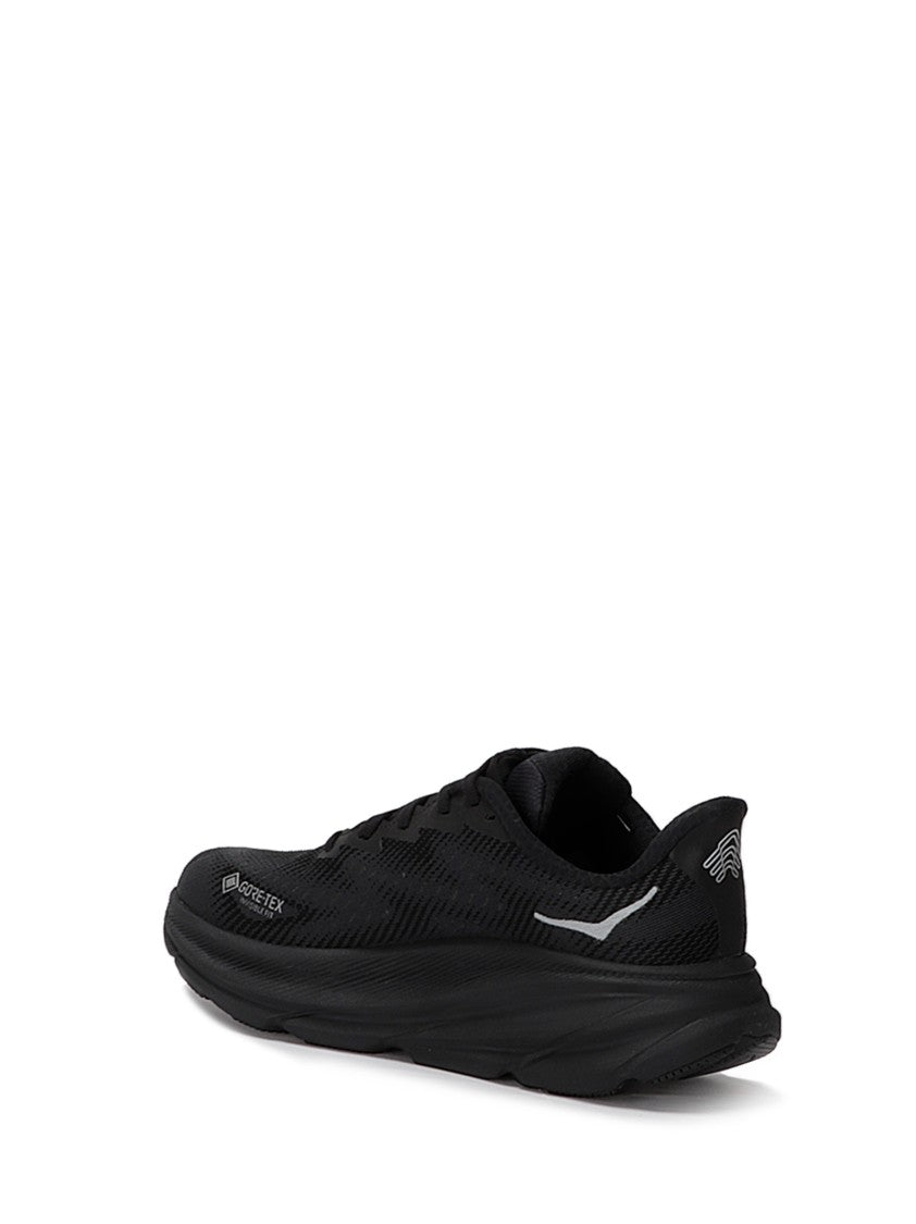 Hoka Streamlined Black Sneakers With Cushioned Sole And Reflective Details