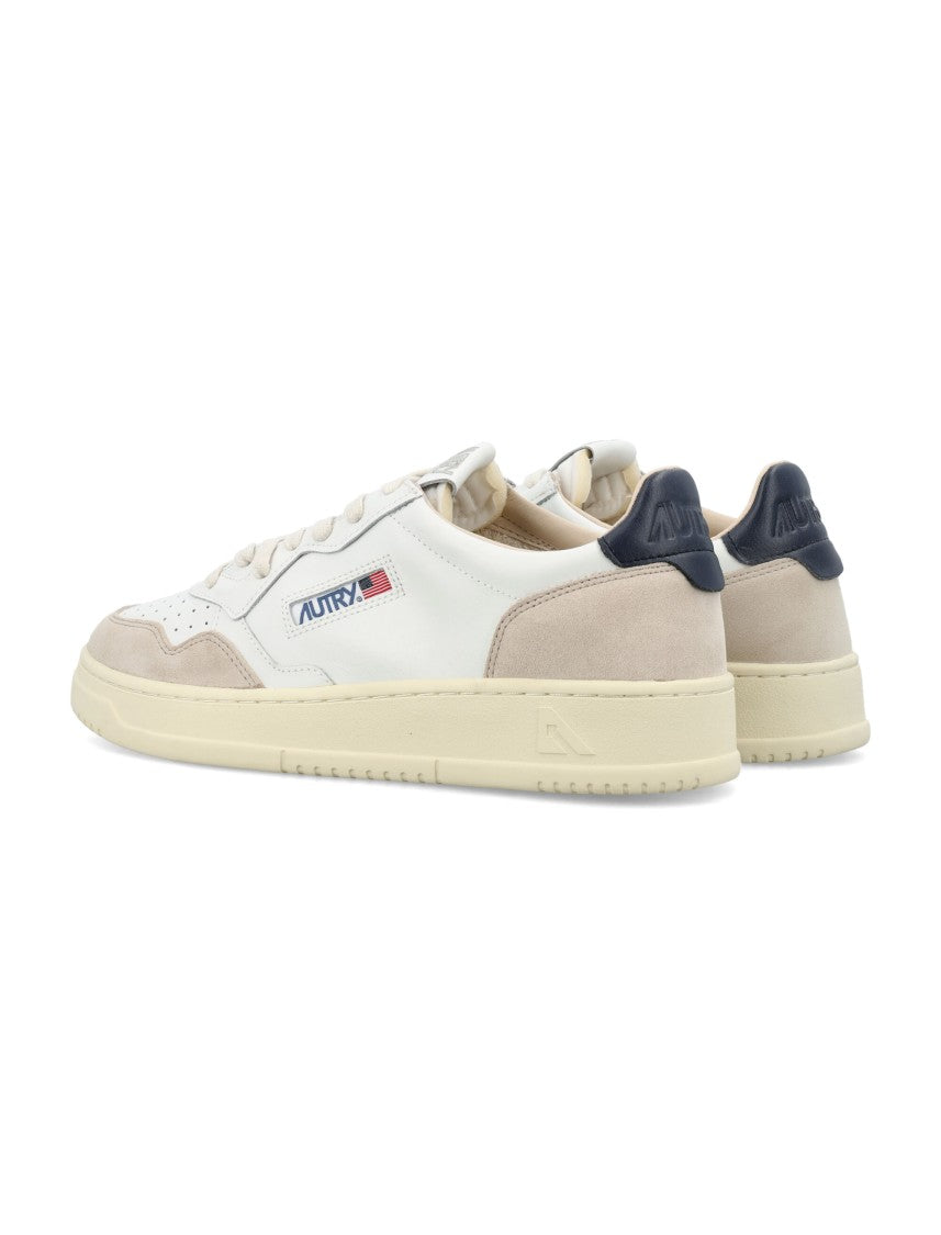 Autry Contemporary Tennis Sneakers With Suede Overlays And Contrasting Detail