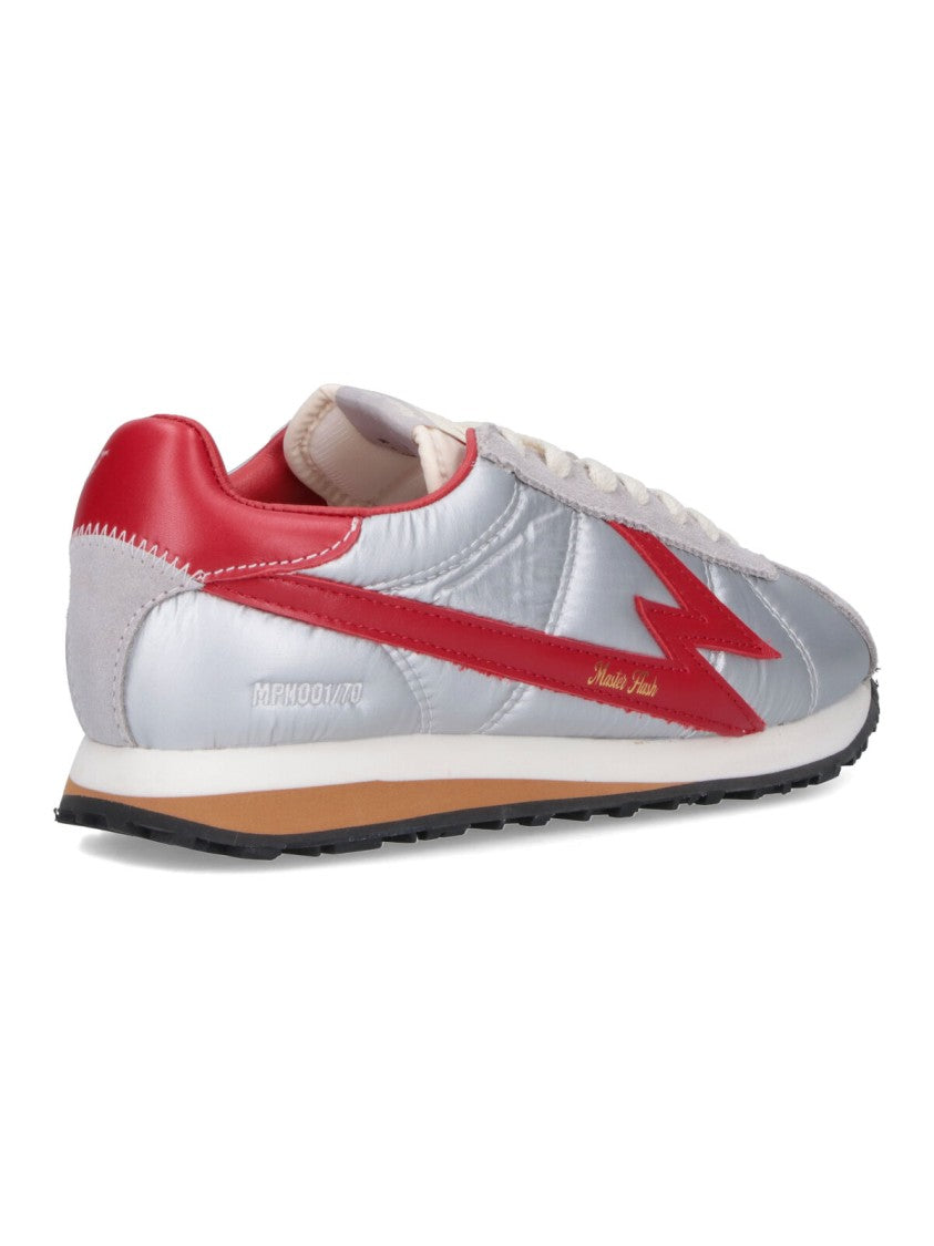 Master Of Arts Shiny Silver Sneakers With Bold Red Lightning Detailing