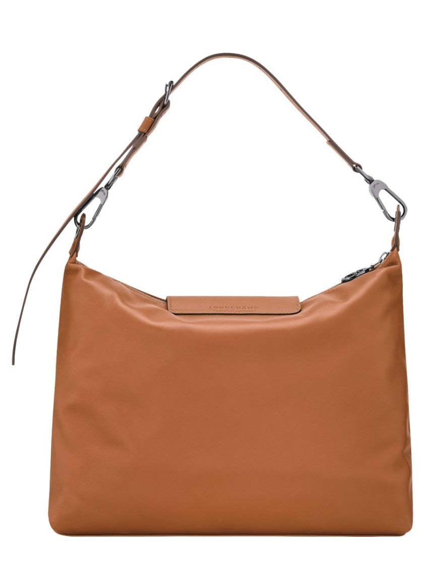 Longchamp Medium Leather Hobo Bag With Adjustable Shoulder Strap And Flap Closure