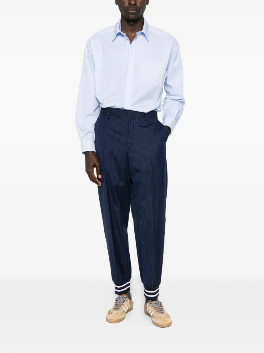 Moschino Relaxed Tapered Pants With Pinstripe Design And Elasticated Cuffs
