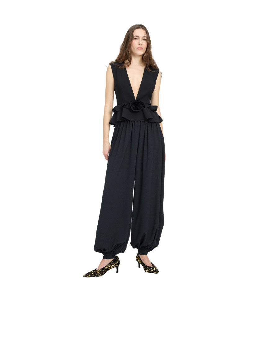 Rotate Sleeveless Black Peplum Top With Decorative Flower