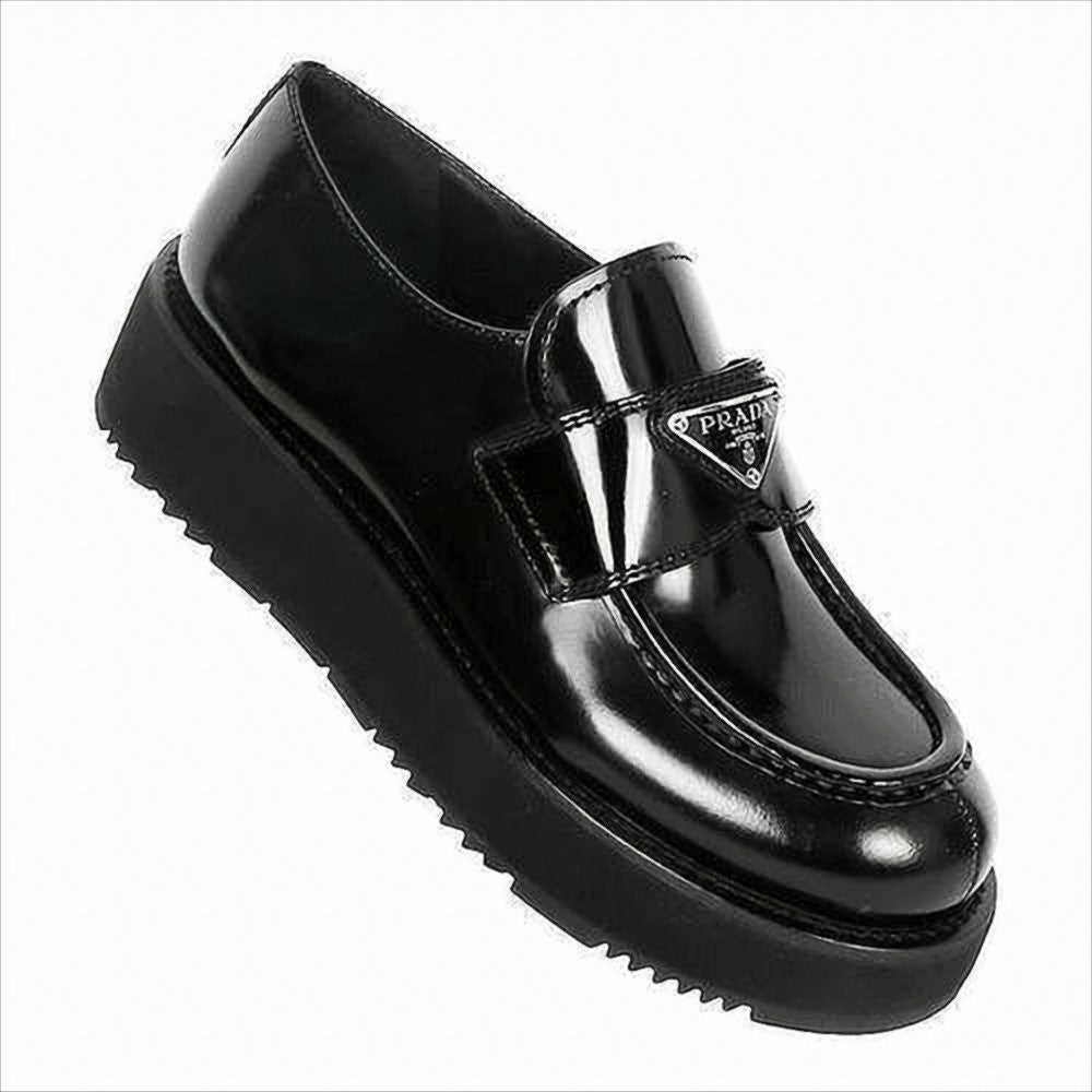 Prada Polished Leather Loafers With Triangular Metal Logo