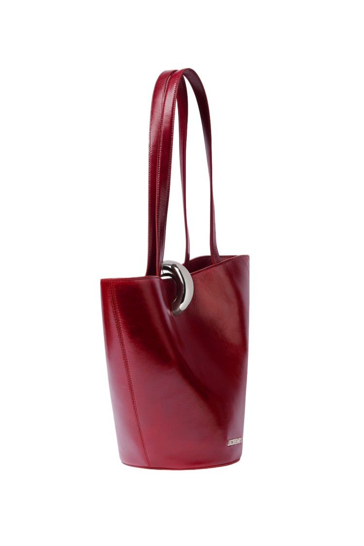 Jacquemus Asymmetric Glossy Leather Bucket Bag With Dual Handles