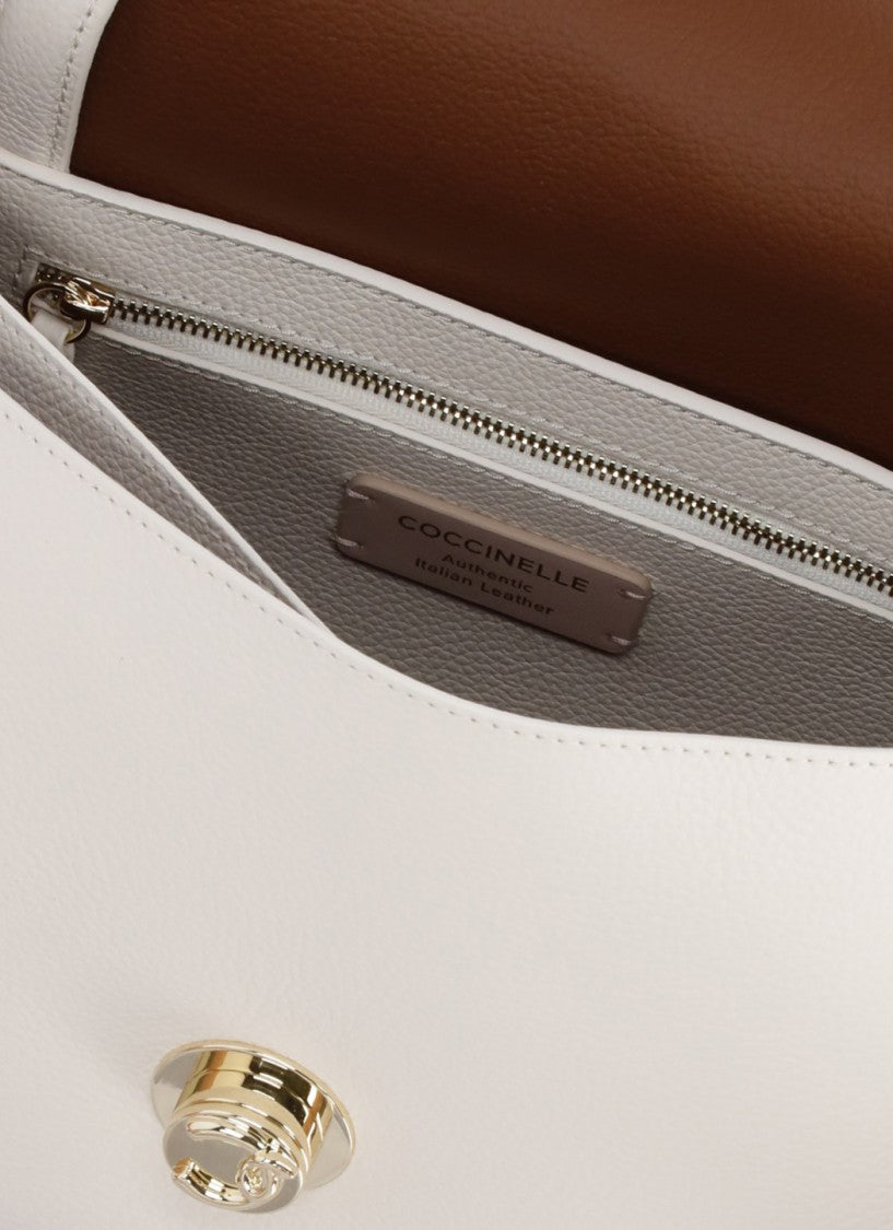 Coccinelle Ivory Pebbled Leather Shoulder Bag With Flap Closure