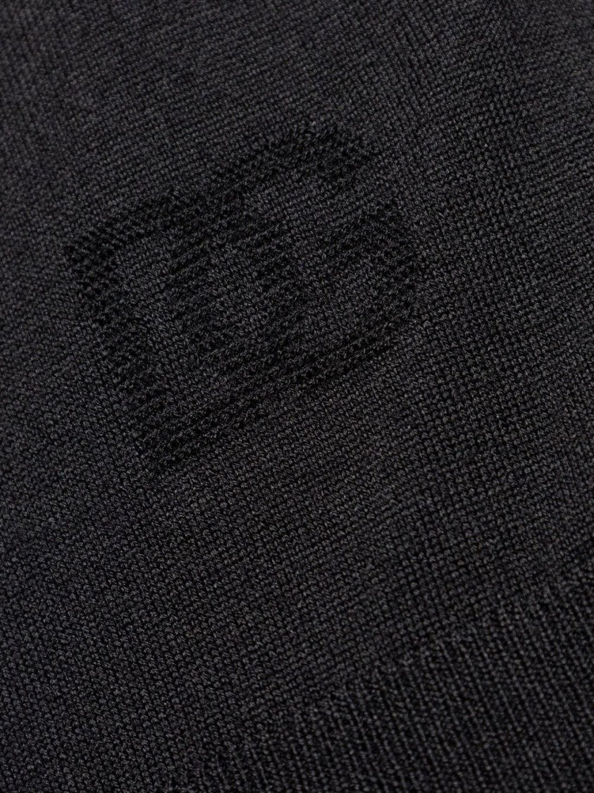 Dolce & Gabbana Fitted Black Turtleneck Sweater With Embossed Detail