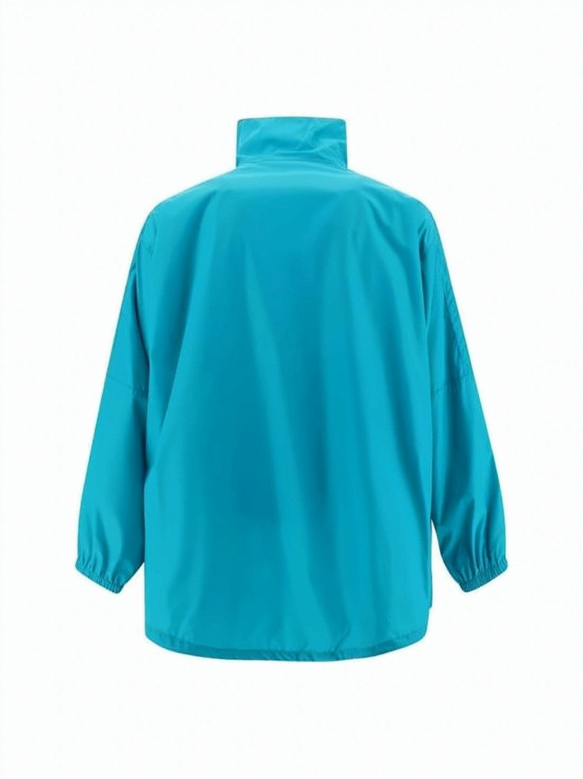 Balenciaga Turquoise Jacket With Bold Black Panel And Striking Lettering