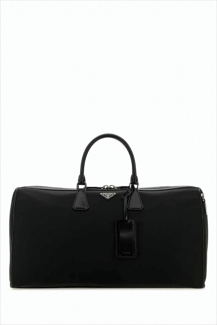 Prada Elongated Duffle Bag With Leather Accents And Triangular Logo
