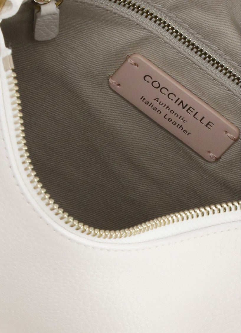 Coccinelle Ivory Leather Nory Small Shoulder Bag With Minimalist Design