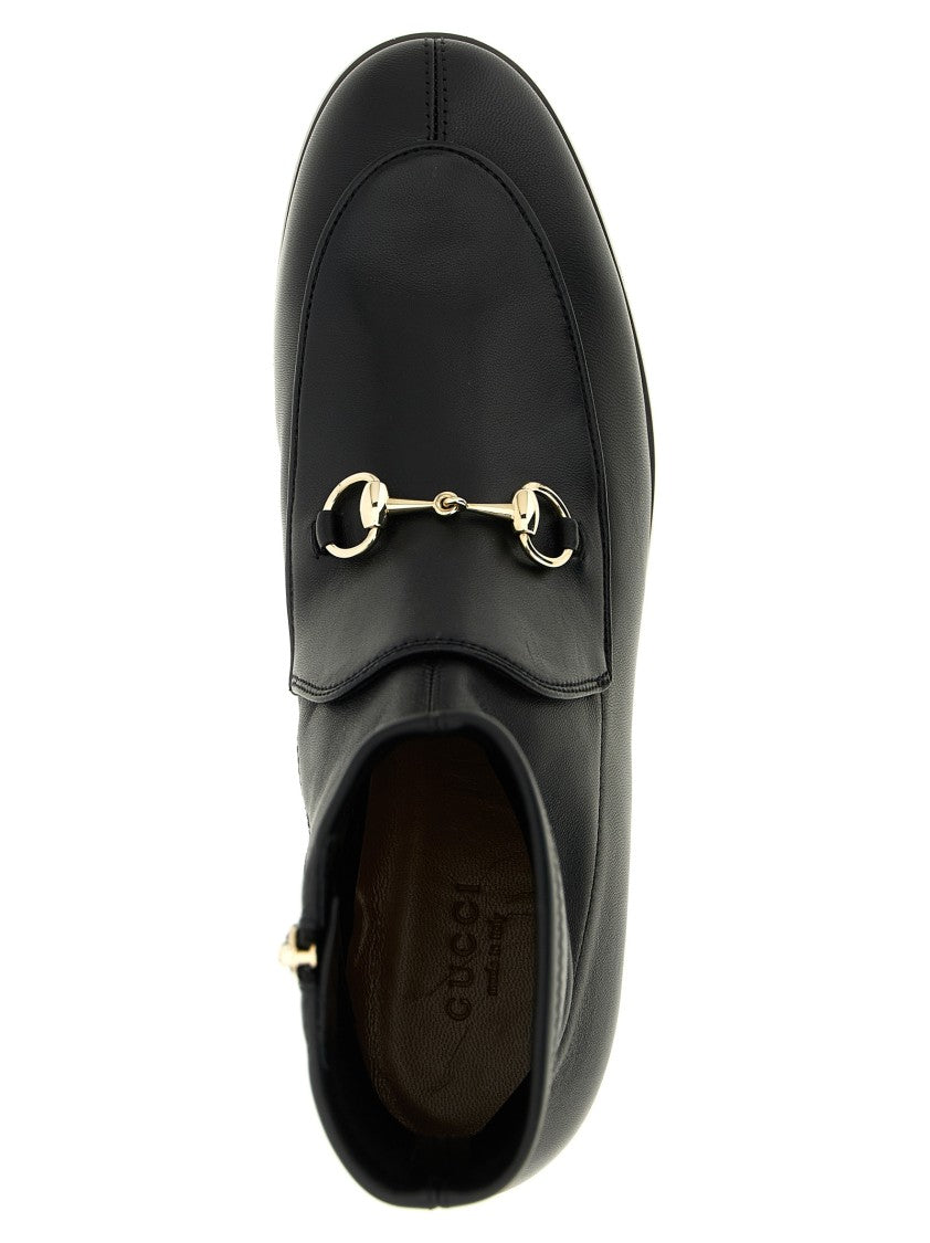 Gucci Stretch Leather Ankle Boots With Metal Clamp Detail